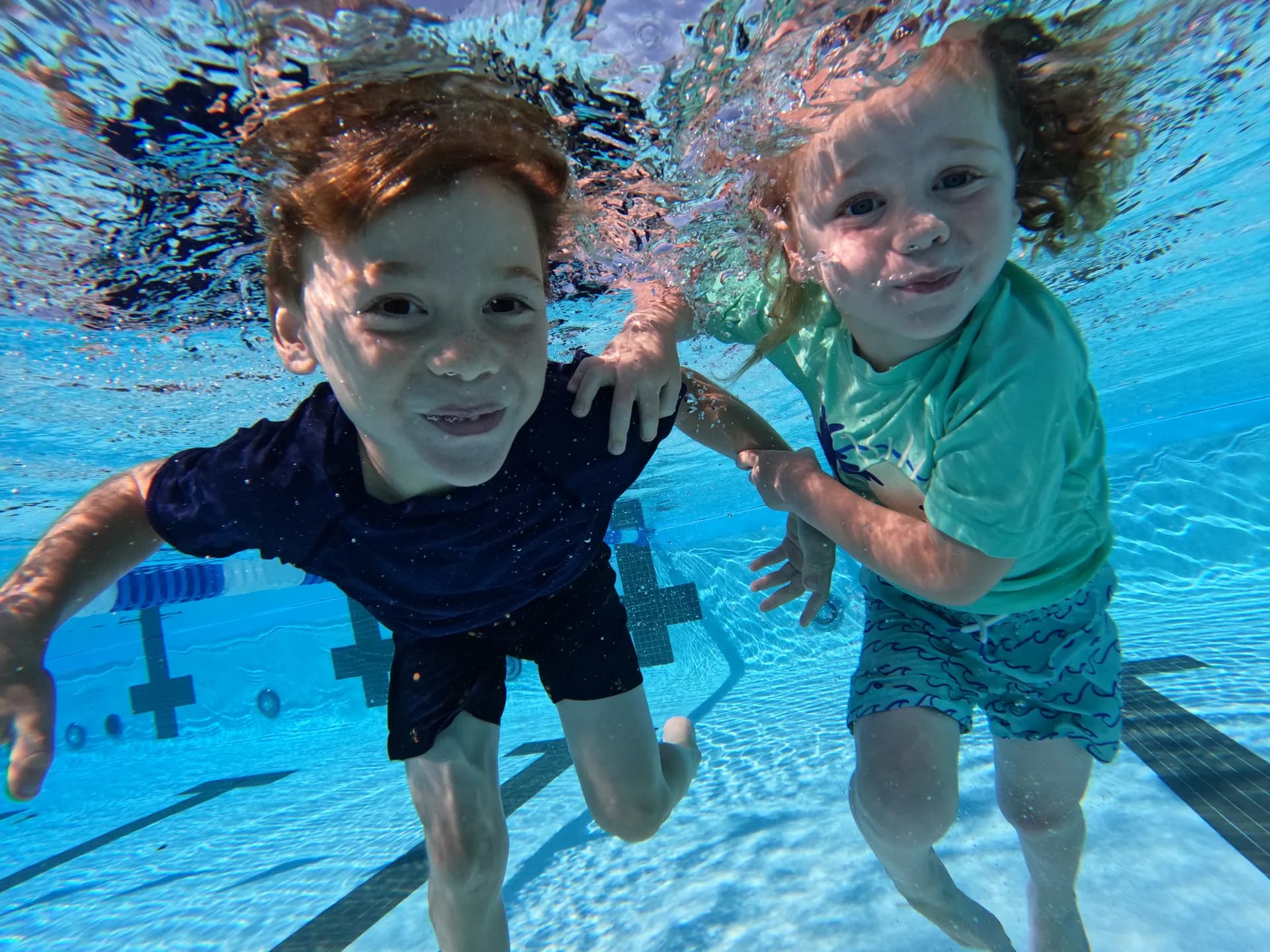 Two boys enjoying their time at the pool