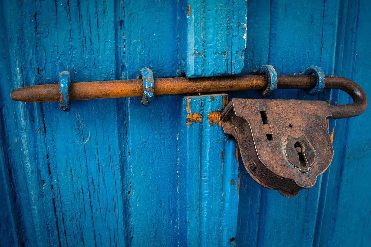 Door locks and safety latches for pool area