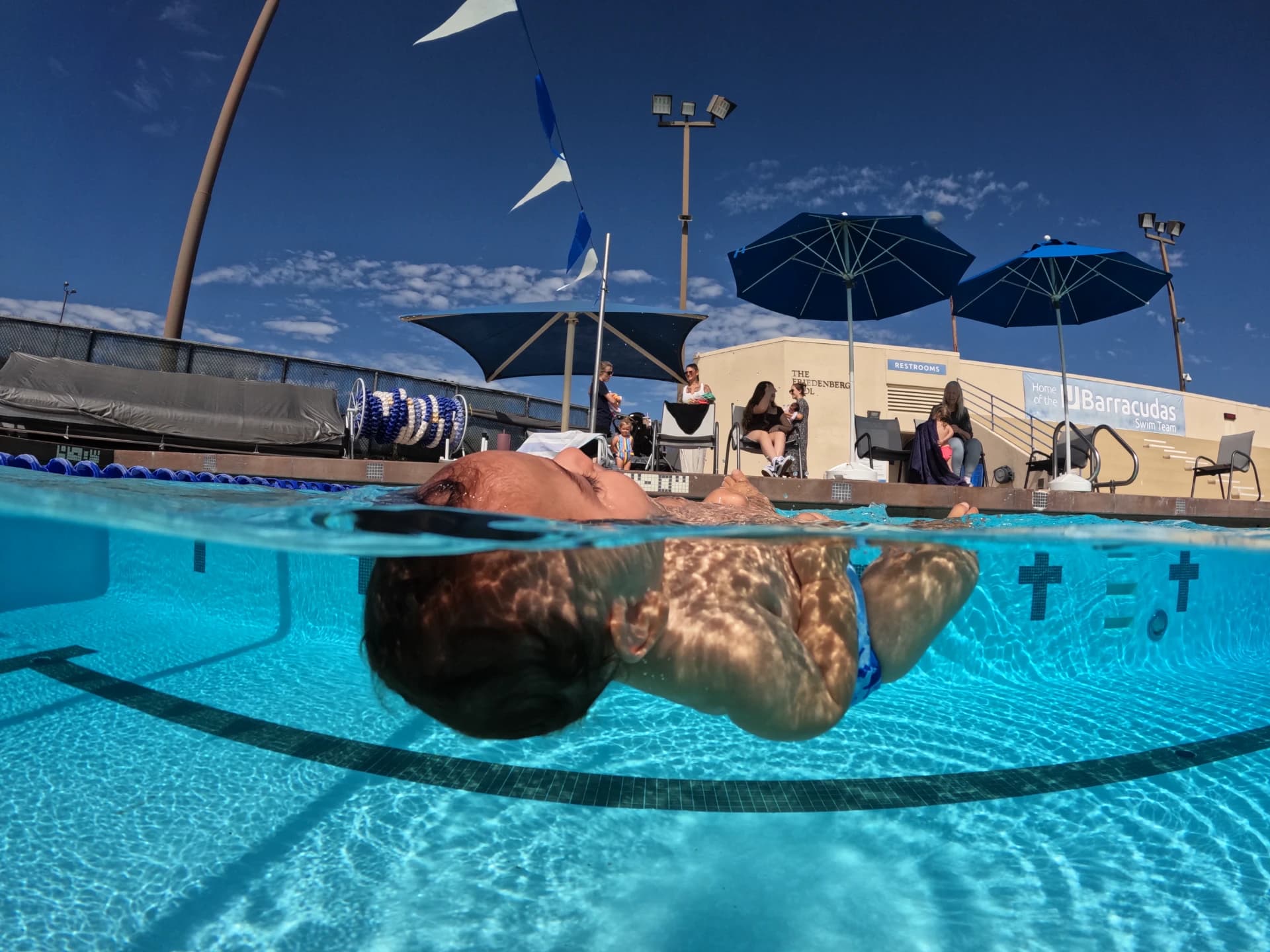 Happy child during swim lesson